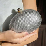 Raya (Silver) – Crystal Beaded Oval Evening Clutch By Dazzle