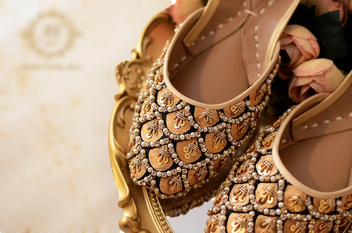 Elegant Golden Juttis with Black Accents and Moti & Zardozi Embellishments For Women
