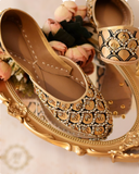 Elegant Golden Juttis with Black Accents and Moti & Zardozi Embellishments For Women