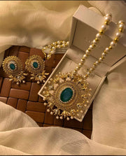 Elevate your accessory collection with the exquisite HANINA Locket Set in a rich Maroon, Black, And Green.
