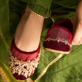 Handcrafted 'Marina Timeless Elegance in Maroon Net with Tilla and Floral Adornments By Dazzle