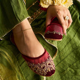 Handcrafted 'Marina Timeless Elegance in Maroon Net with Tilla and Floral Adornments By Dazzle